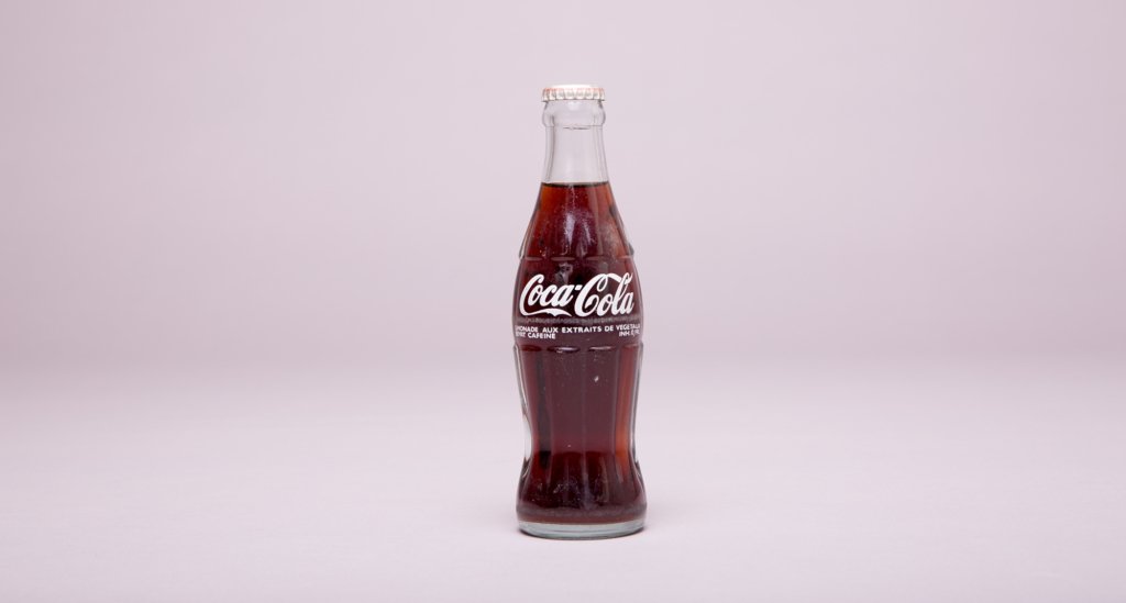 An original 1915 hobble skirt Coke bottle