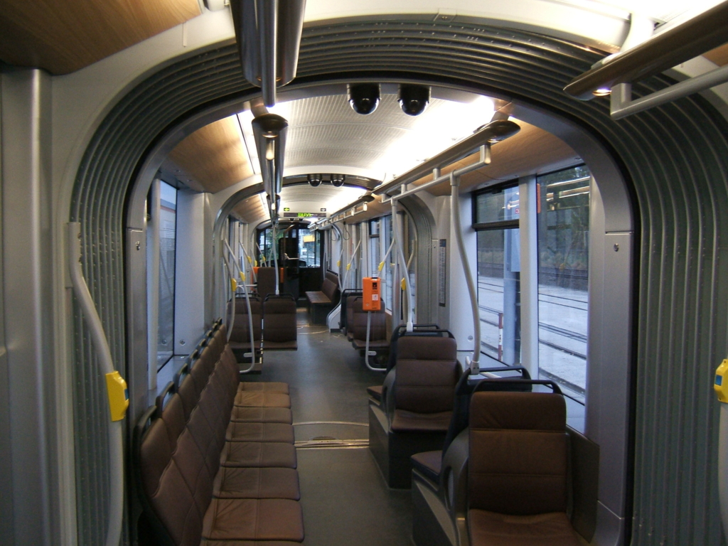The interior of a new Brussels tram car, with leather seats and inset lighting