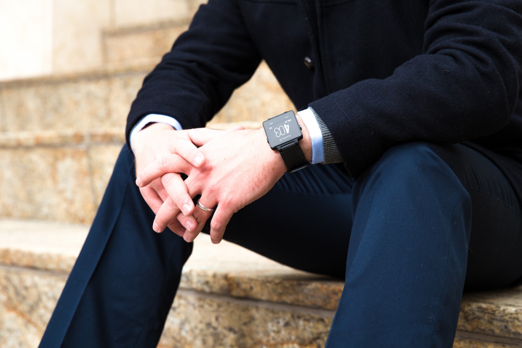 Garmin VívoActive Smart Watch Man wearing Garmin VívoActive Smart Watch in black