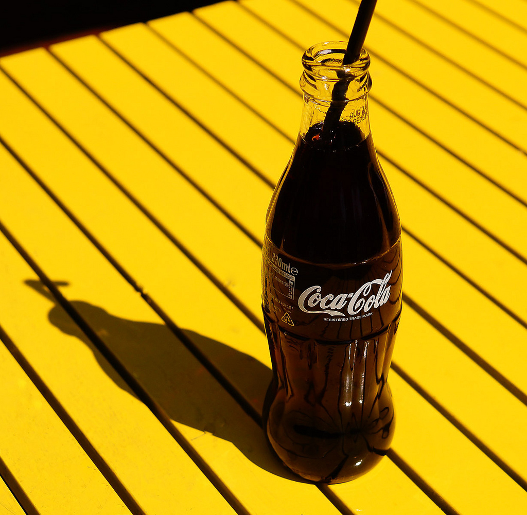 A Coca-Cola bottle in the sun