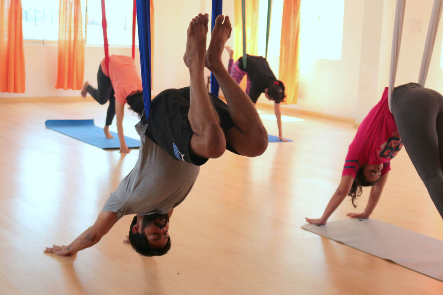 Challenge Yourself: Try Aerial Yoga – Amex Essentials