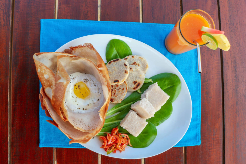 1b Breakfast_ Egg hoppers, coconut roti and milk rice.jpeg