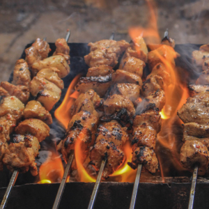 All sorts of different barbecued meat skewers